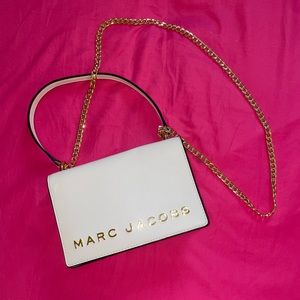 Marc Jacob cream crossbody with a gold chain